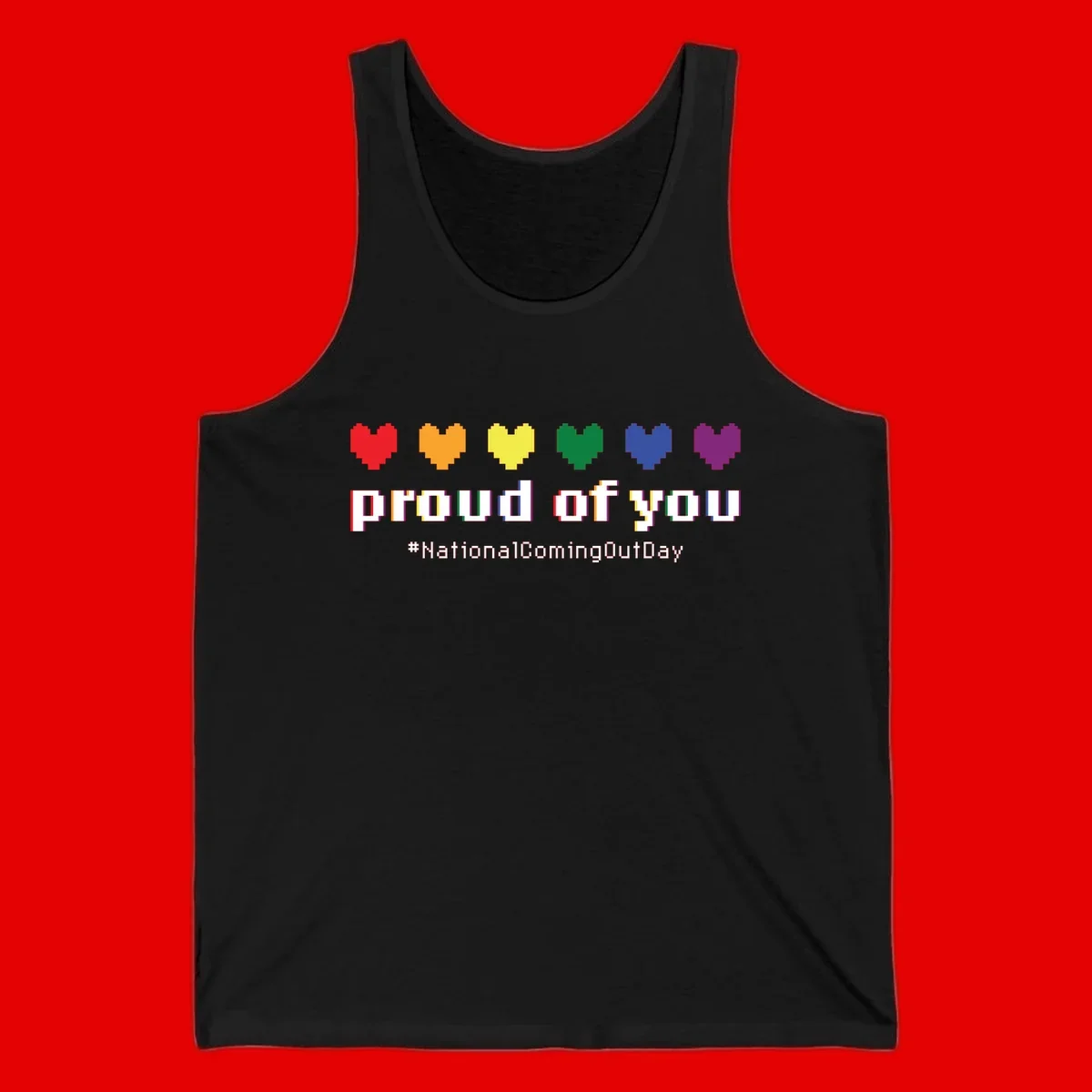 Pixel-art design with six rainbow hearts and text reading 'proud of you #NationalComingOutDay' celebrating coming out visibility