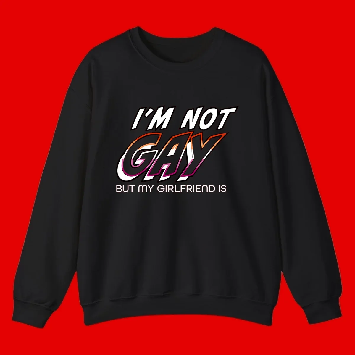 Bold typography design reading 'I'm not gay but my girlfriend is' in orange and magenta layered 3D letters