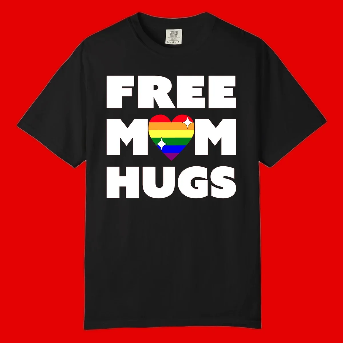 Free Mom Hugs design with rainbow pride heart featuring red, orange, yellow, green, blue, and purple stripes with white sparkles