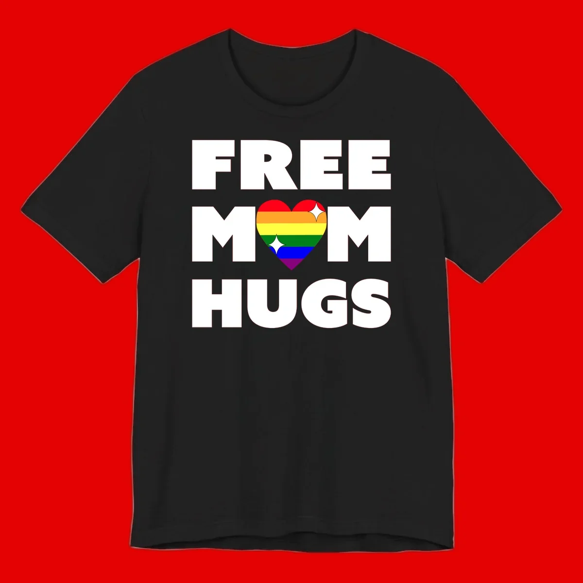 Free Mom Hugs design with rainbow pride heart featuring red, orange, yellow, green, blue, and purple stripes with white sparkles