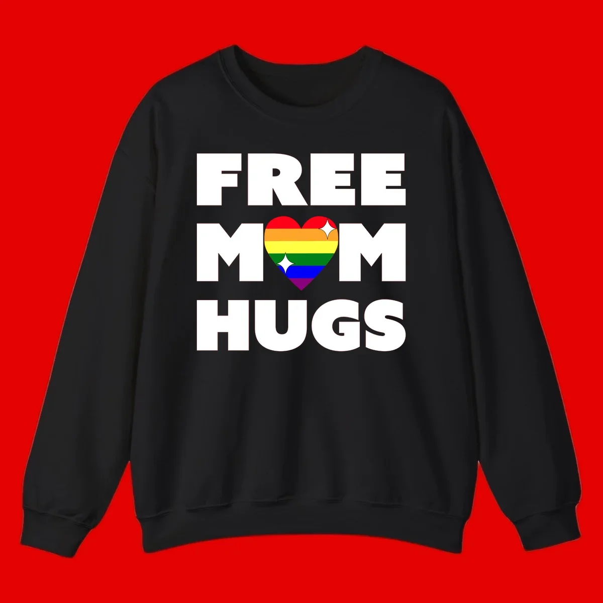 Free Mom Hugs design with rainbow pride heart featuring red, orange, yellow, green, blue, and purple stripes with white sparkles