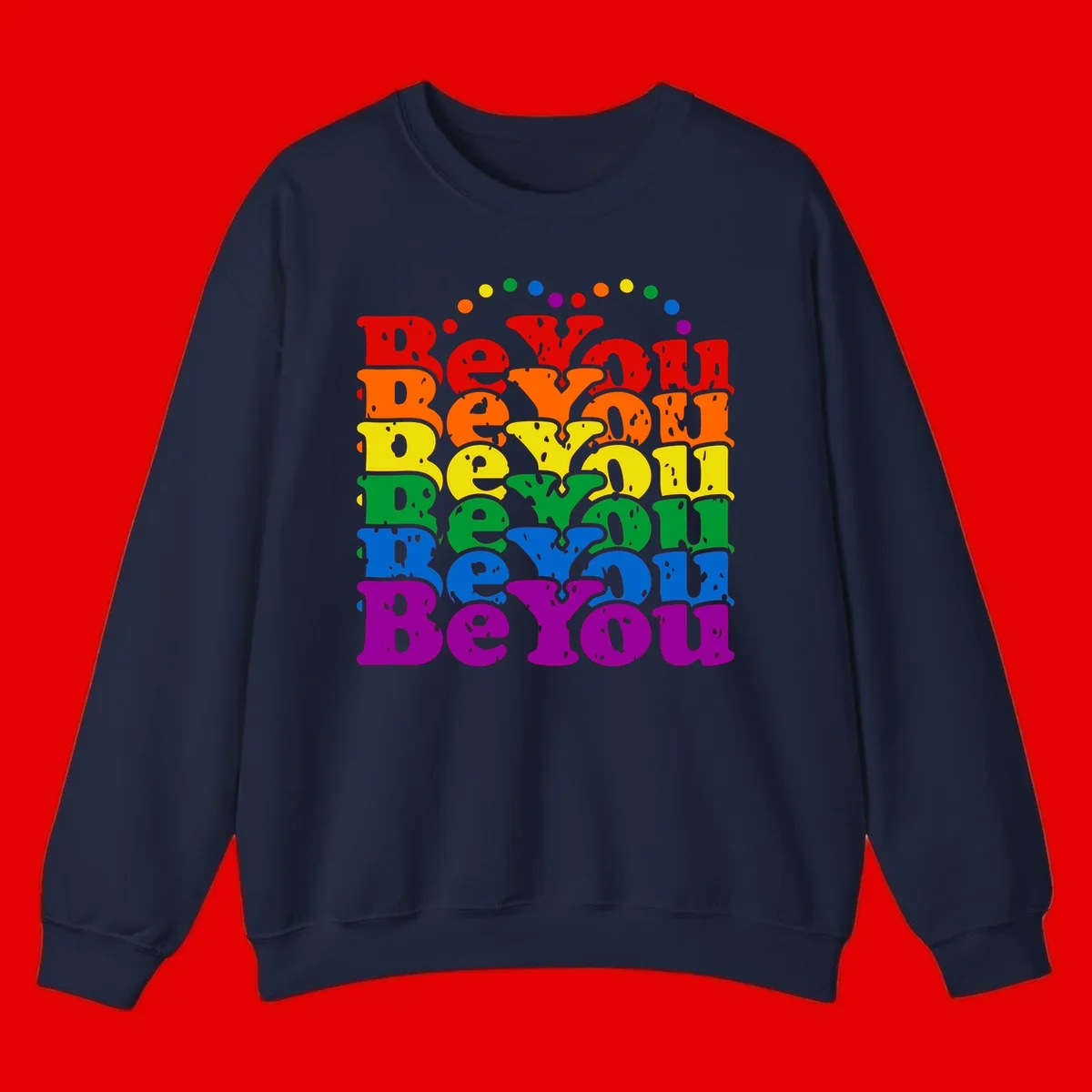 Stacked rainbow-colored letters spelling 'Beyond The Rainbow' with grunge texture and floating colorful circles, pride celebration design