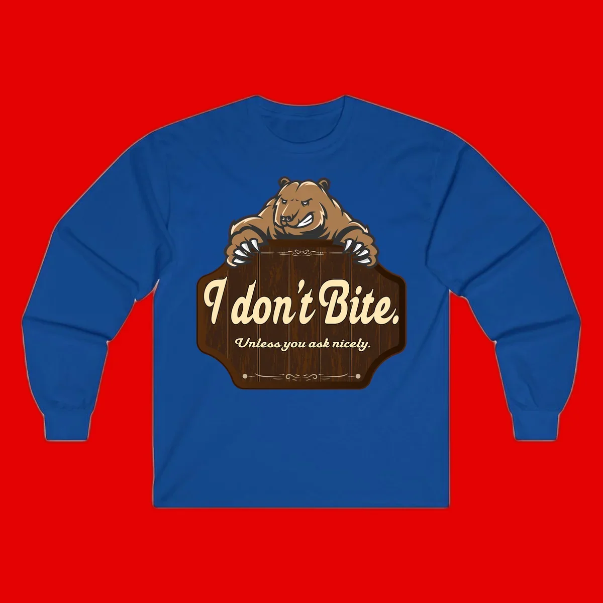 Brown grizzly bear grinning mischievously while holding a wooden sign reading 'I don't Bite. Unless you ask nicely' with decorative vintage styling