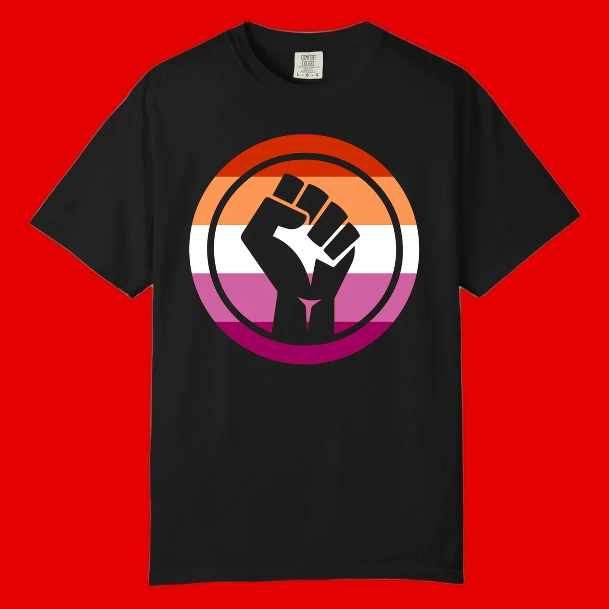 Raised fist silhouette on rainbow pride flag stripes within concentric circles, symbolizing LGBTQ+ strength and solidarity