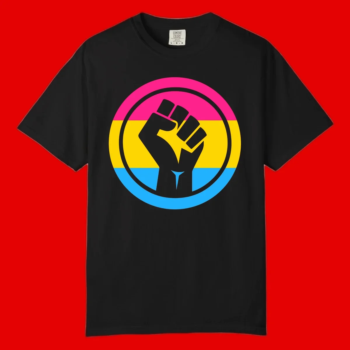 Raised fist silhouette in circular badge with magenta, yellow, and blue pride stripes symbolizing fist-pride-power and activism