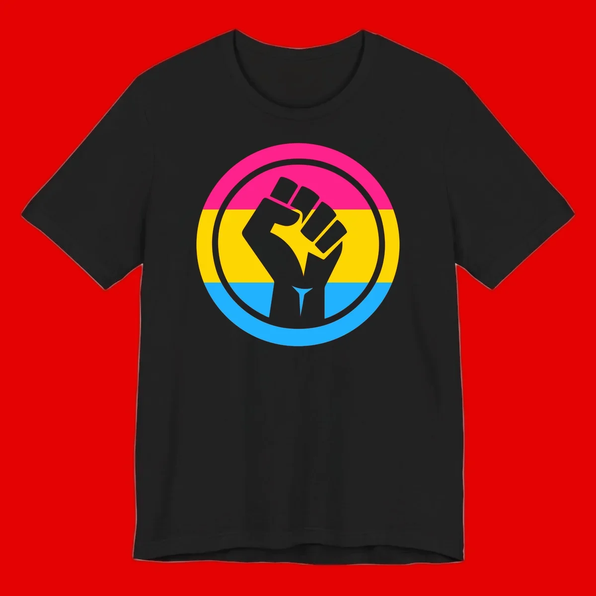 Raised fist silhouette in circular badge with magenta, yellow, and blue pride stripes symbolizing fist-pride-power and activism