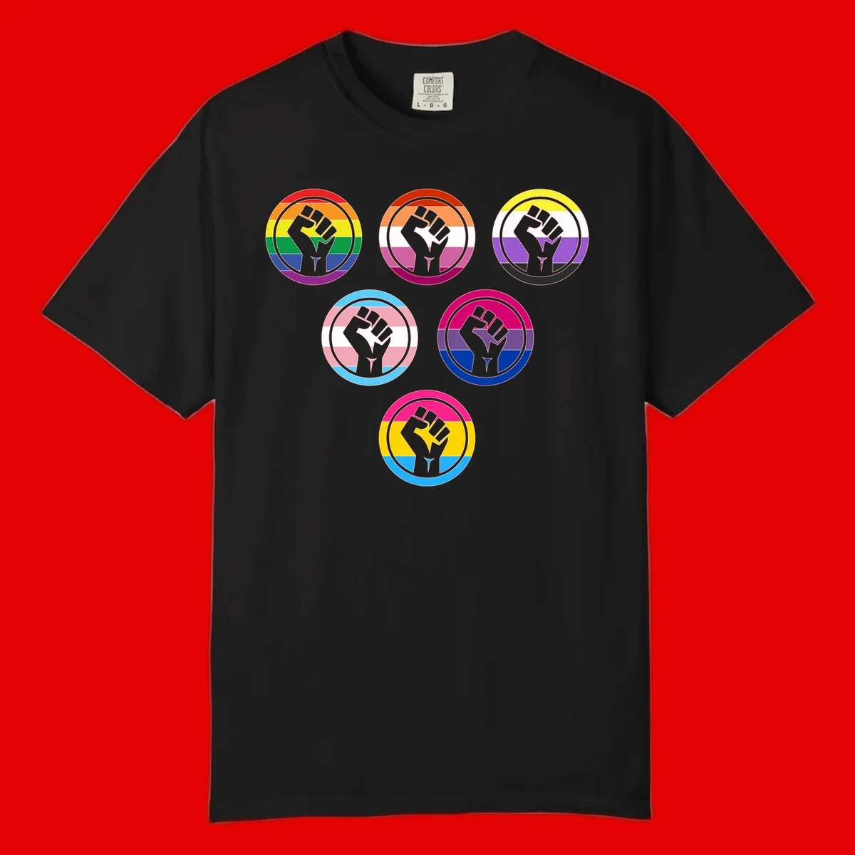 Six circular badge designs with raised fist symbols in different pride flag color schemes including rainbow, trans, and pansexual flags