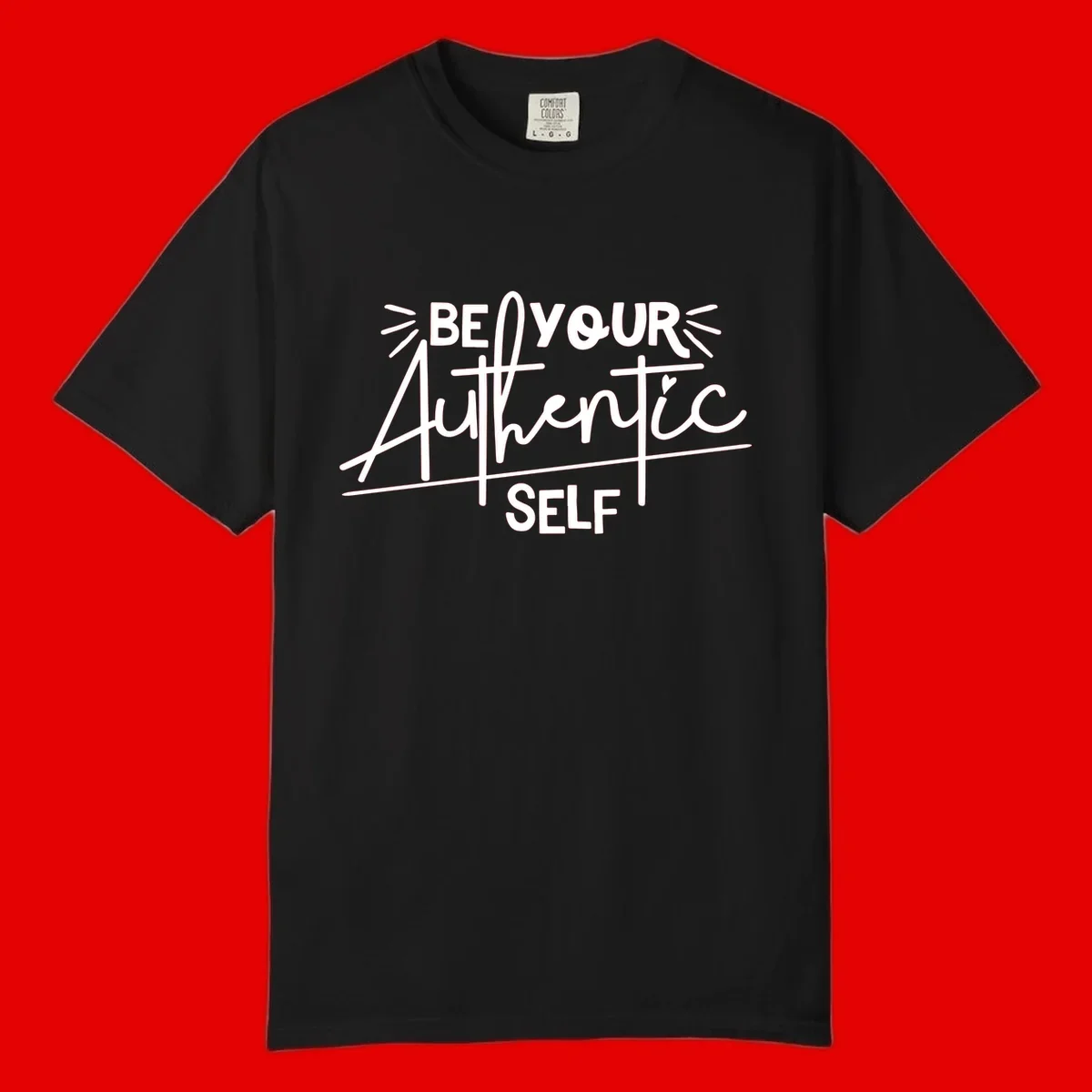 White hand-lettered text reading 'Be Your Authentic Self' with decorative radiating lines and a small heart on gray background