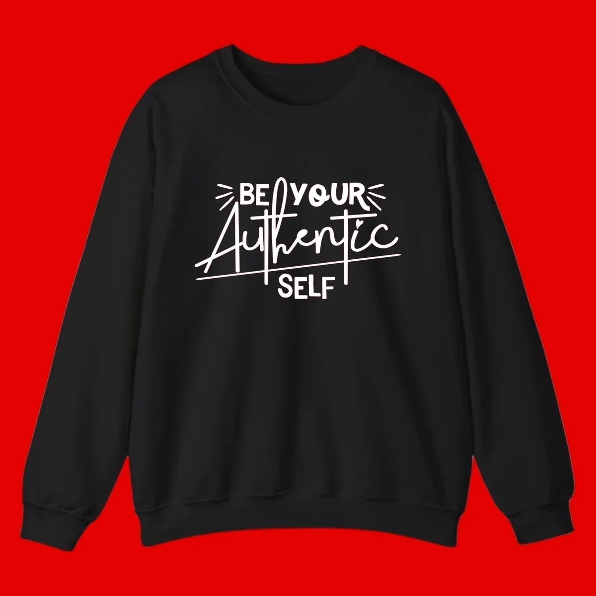 White hand-lettered text reading 'Be Your Authentic Self' with decorative radiating lines and a small heart on gray background