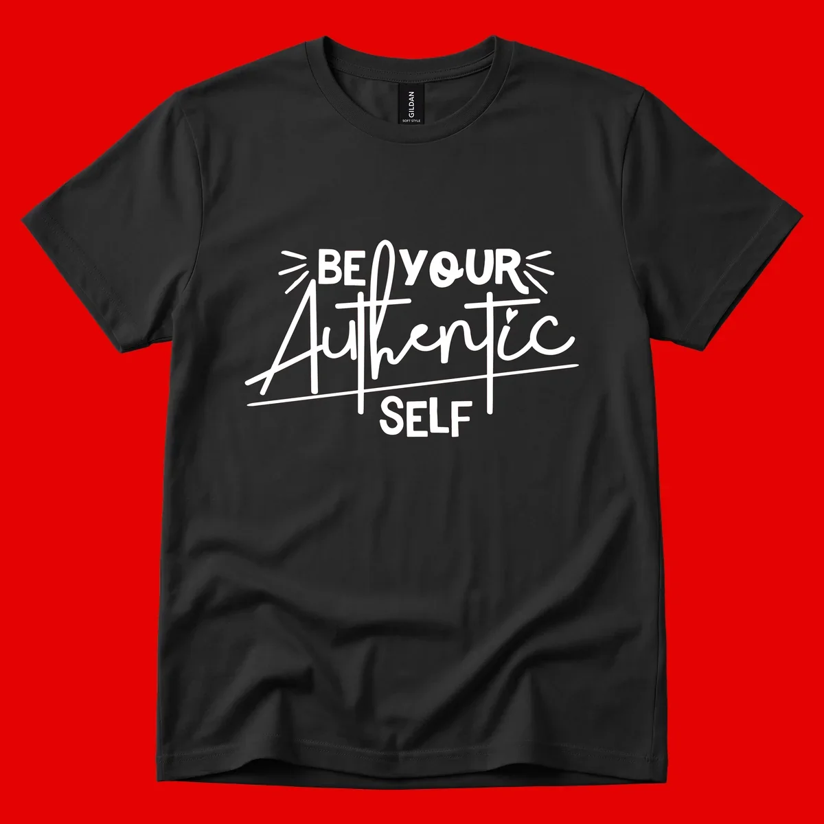 White hand-lettered text reading 'Be Your Authentic Self' with decorative radiating lines and a small heart on gray background