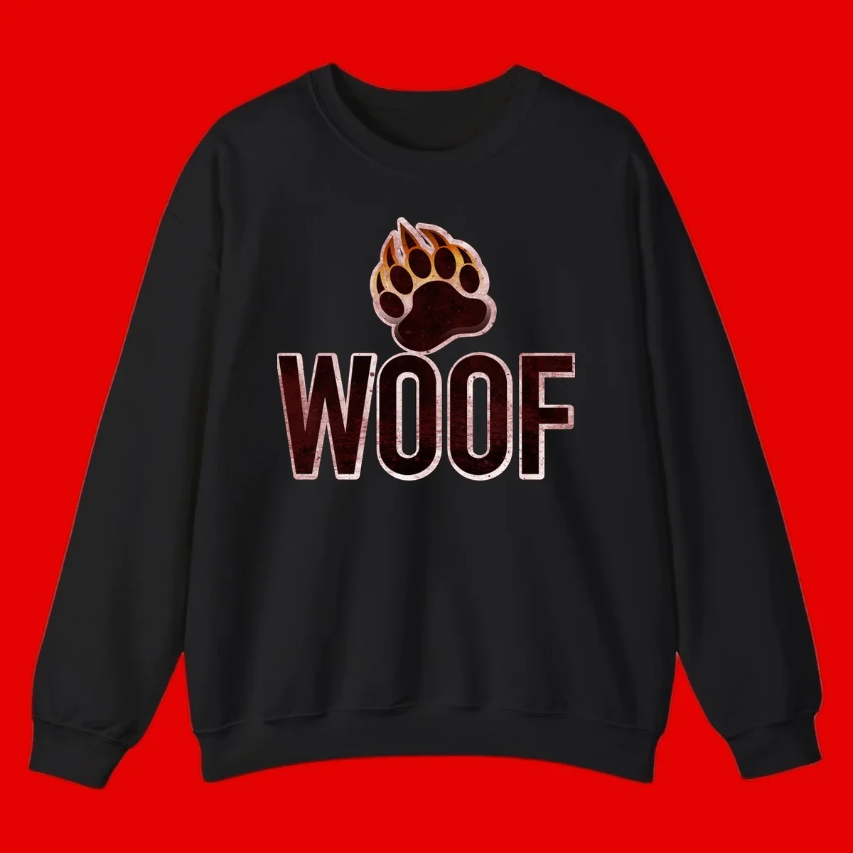 Woof paw print fire design: large paw with orange and gold flame claws above distressed 'WOOF' text