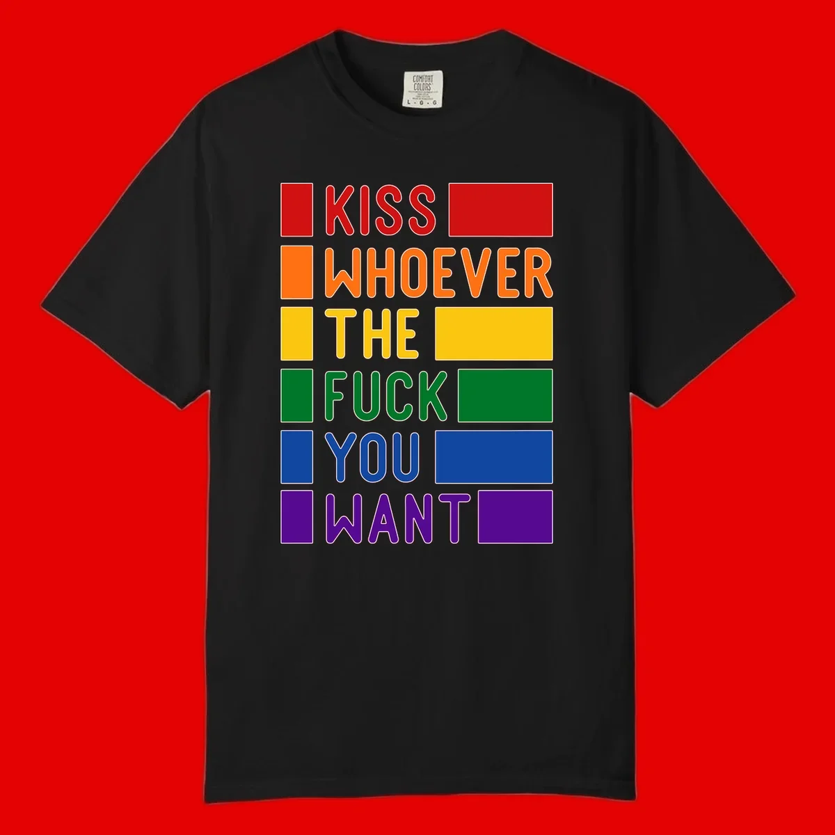 Colorful rainbow typography design reading 'Kiss Whoever The Fuck You Want' with each word in different pride colors on gray background