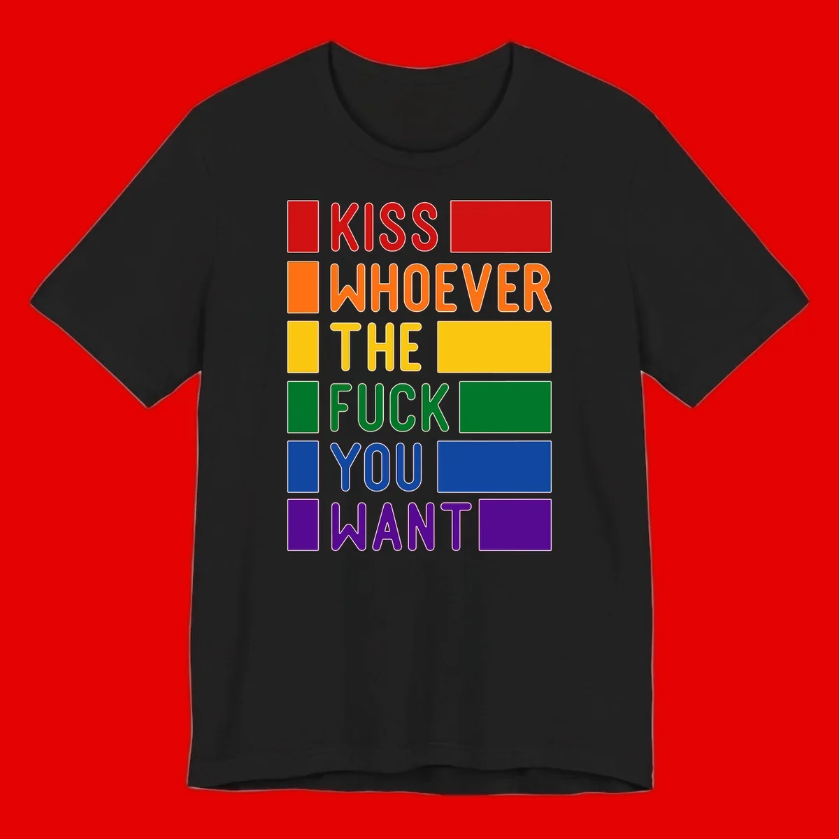 Colorful rainbow typography design reading 'Kiss Whoever The Fuck You Want' with each word in different pride colors on gray background