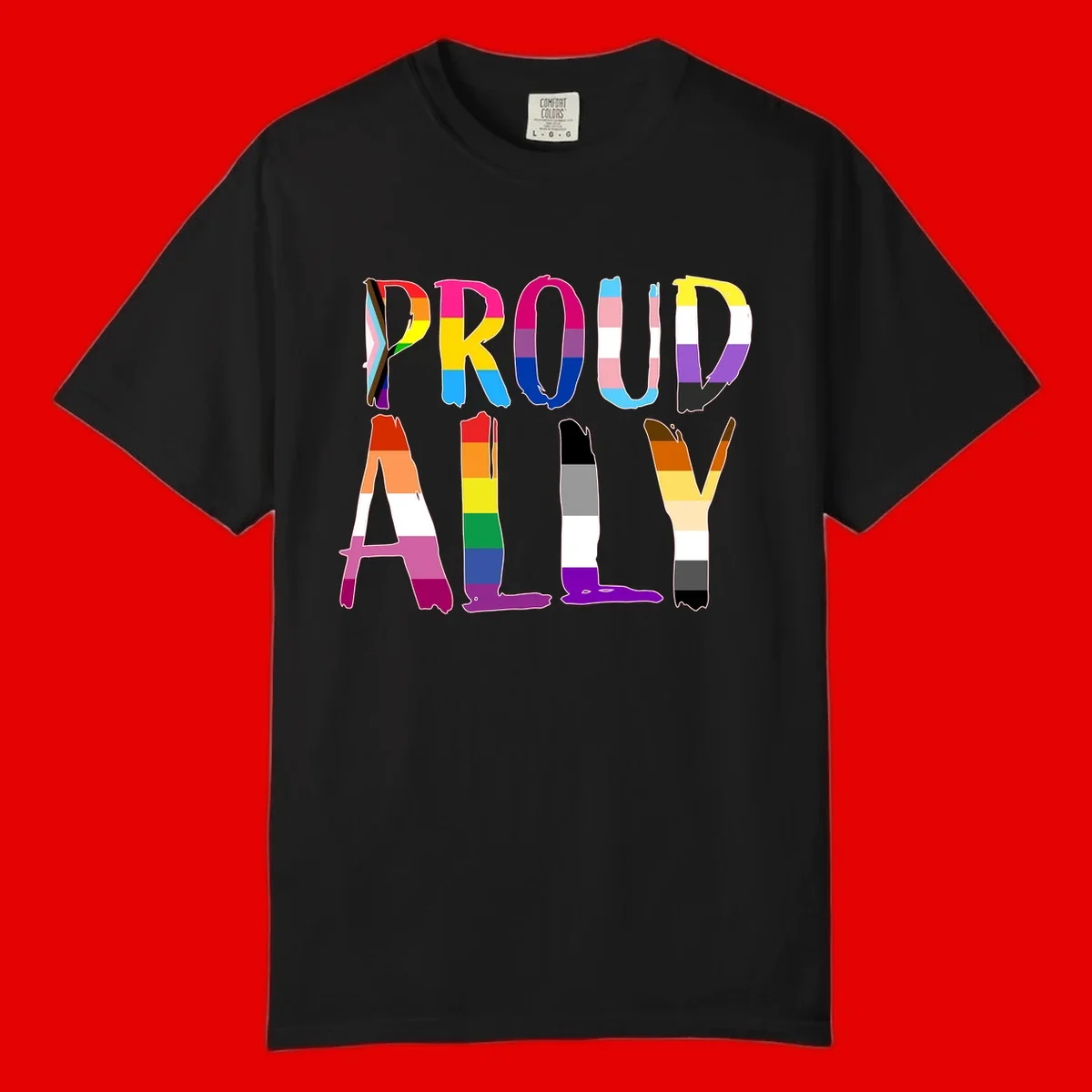 Colorful block letters spelling PROUD filled with rainbow pride flag stripes and patterns including trans and progress pride designs