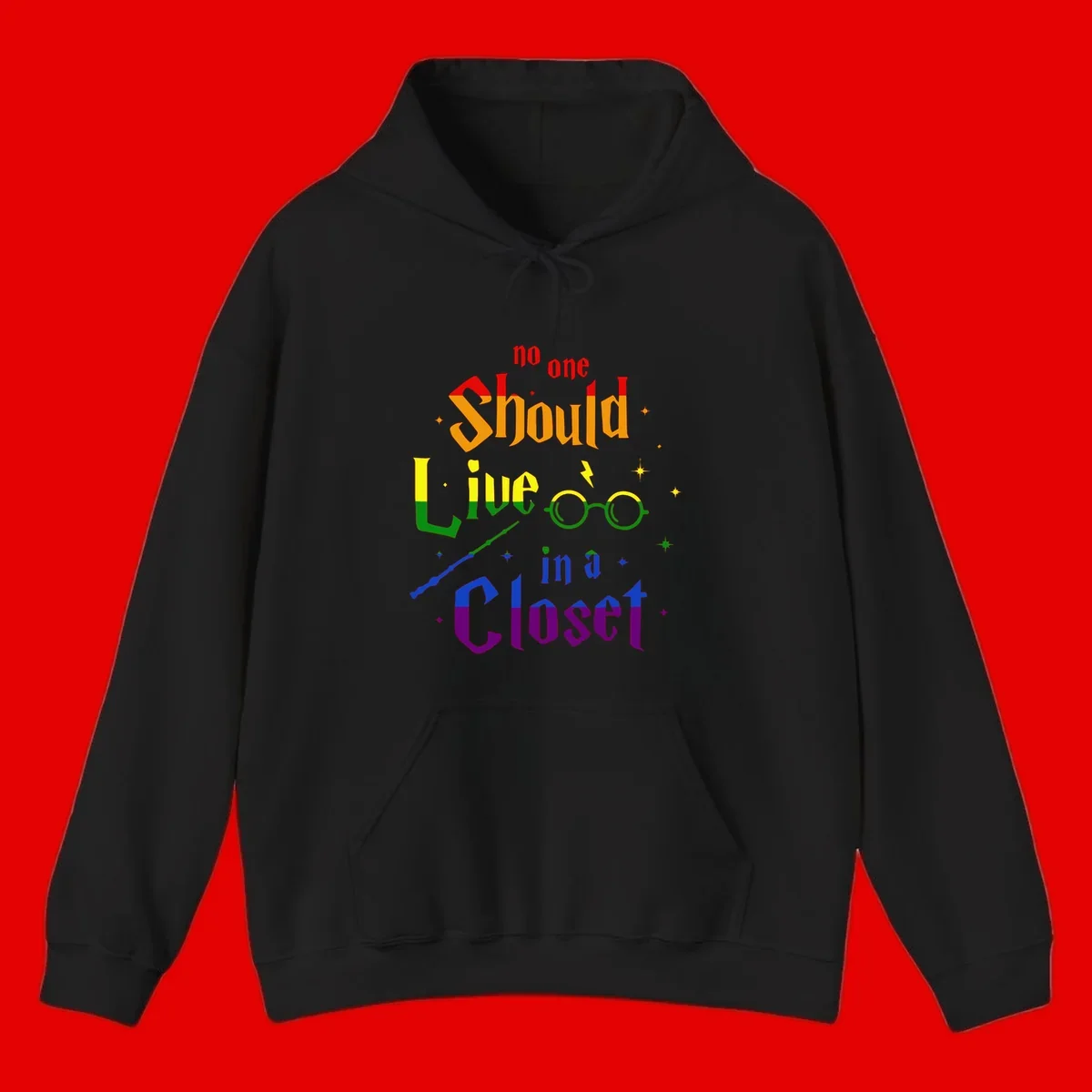 Rainbow gradient text reading 'no one Should live in a Closet' with magical elements including glasses, wand, and stars on gray background