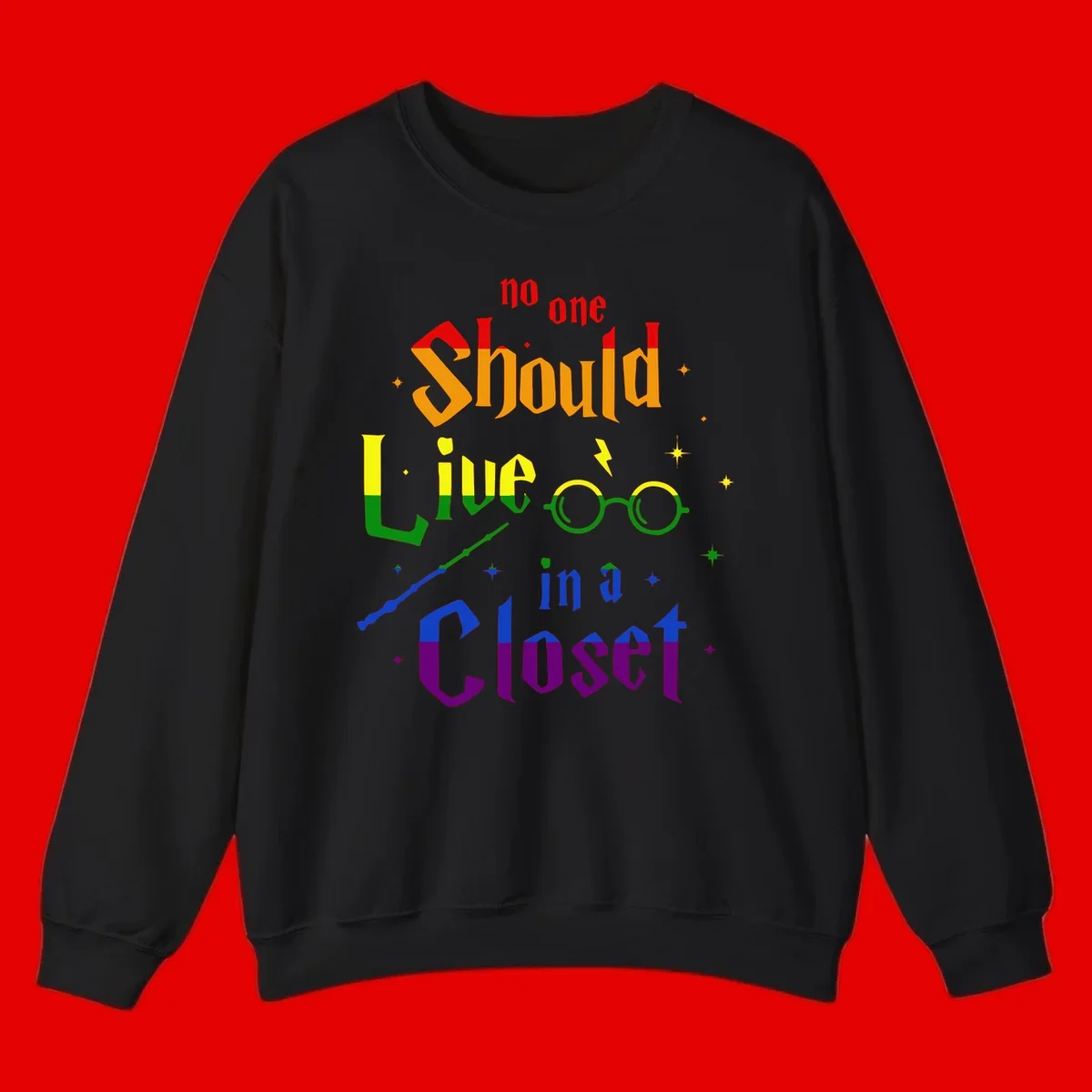 Rainbow gradient text reading 'no one Should live in a Closet' with magical elements including glasses, wand, and stars on gray background