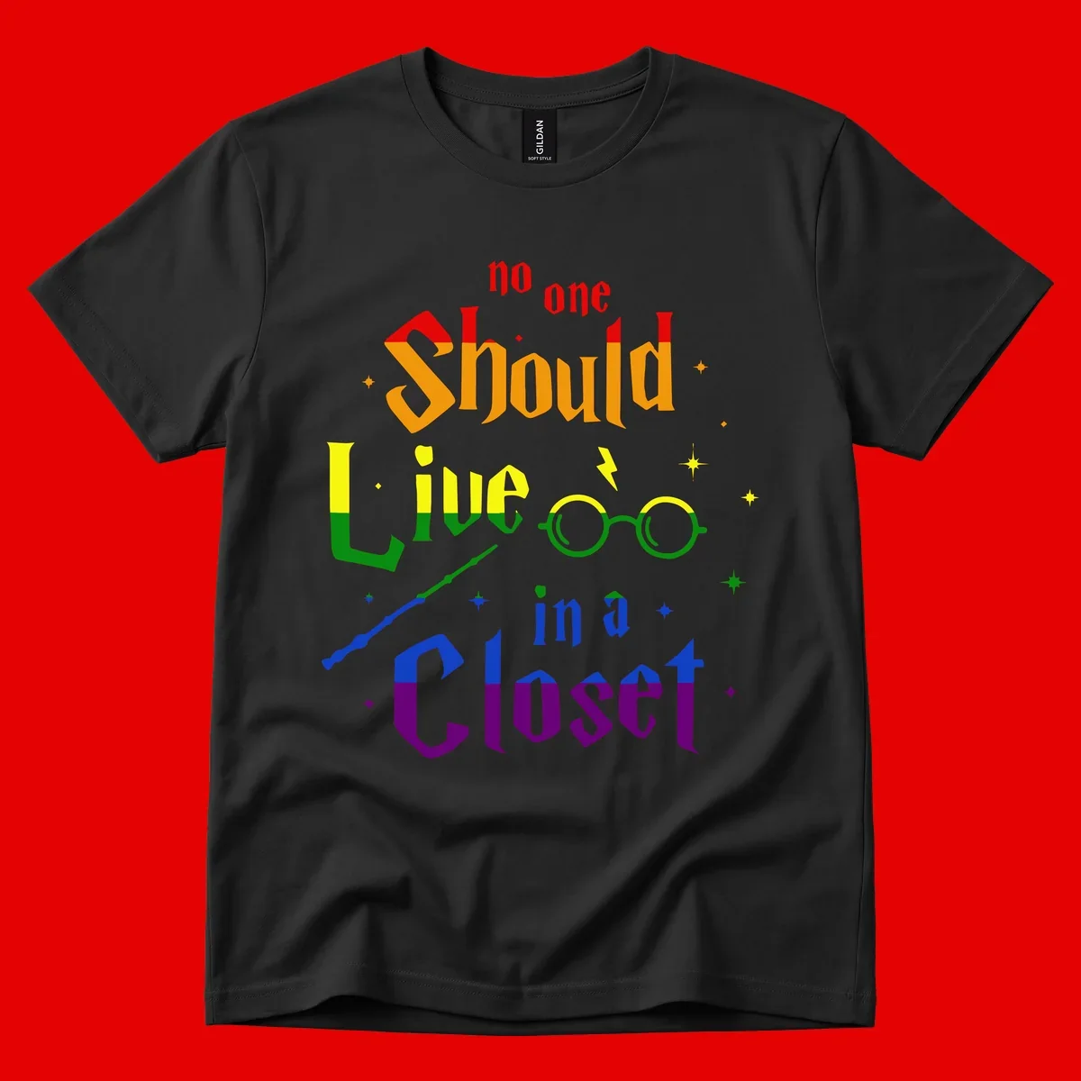 Rainbow gradient text reading 'no one Should live in a Closet' with magical elements including glasses, wand, and stars on gray background