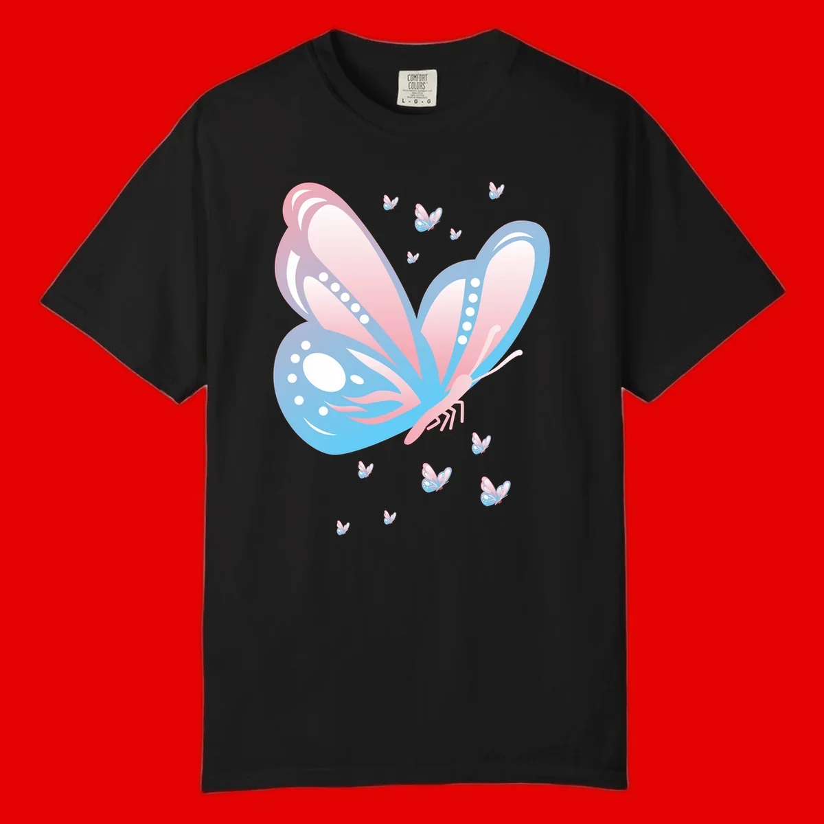 Large butterfly with pink and blue gradient wings featuring white dot details, surrounded by smaller flying butterflies on gray background