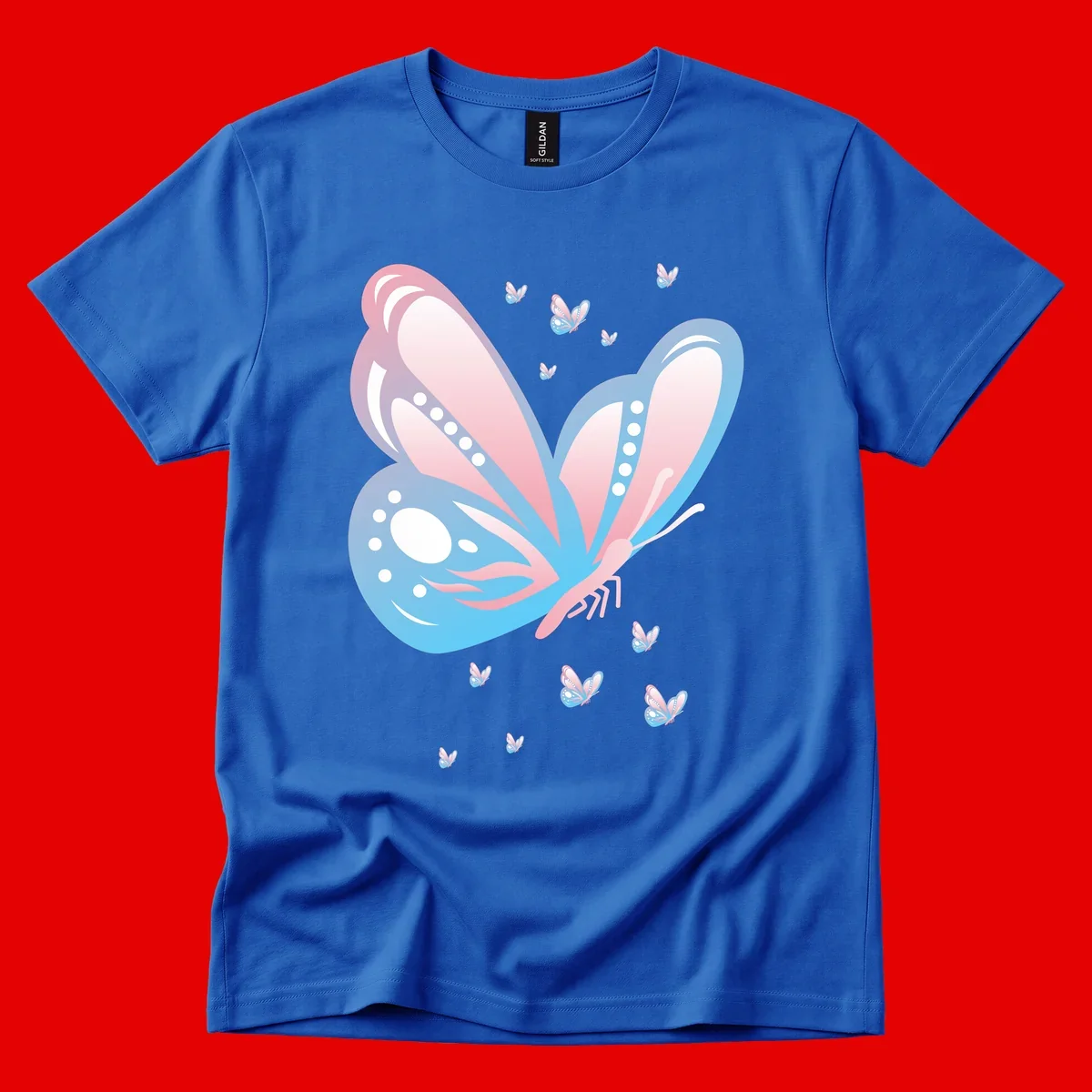 Large butterfly with pink and blue gradient wings featuring white dot details, surrounded by smaller flying butterflies on gray background