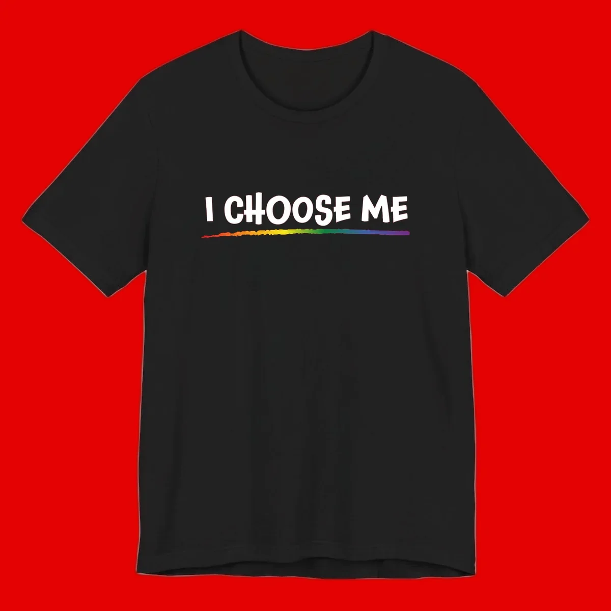 White text 'I Choose Me' above a vibrant rainbow gradient bar with pride flag colors on gray background