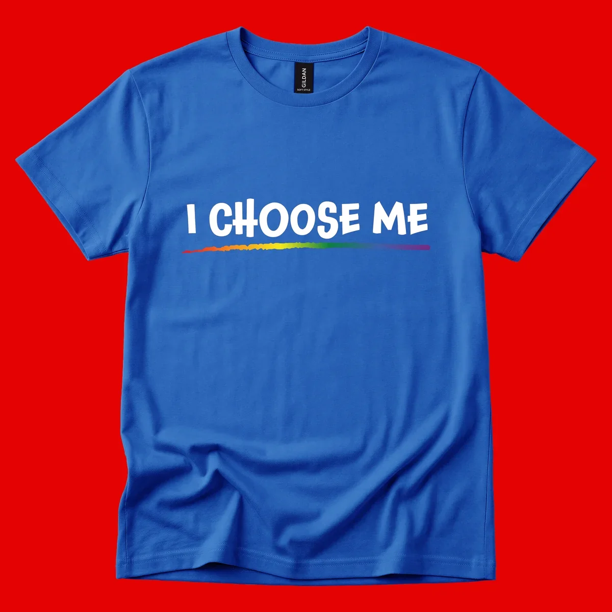 White text 'I Choose Me' above a vibrant rainbow gradient bar with pride flag colors on gray background