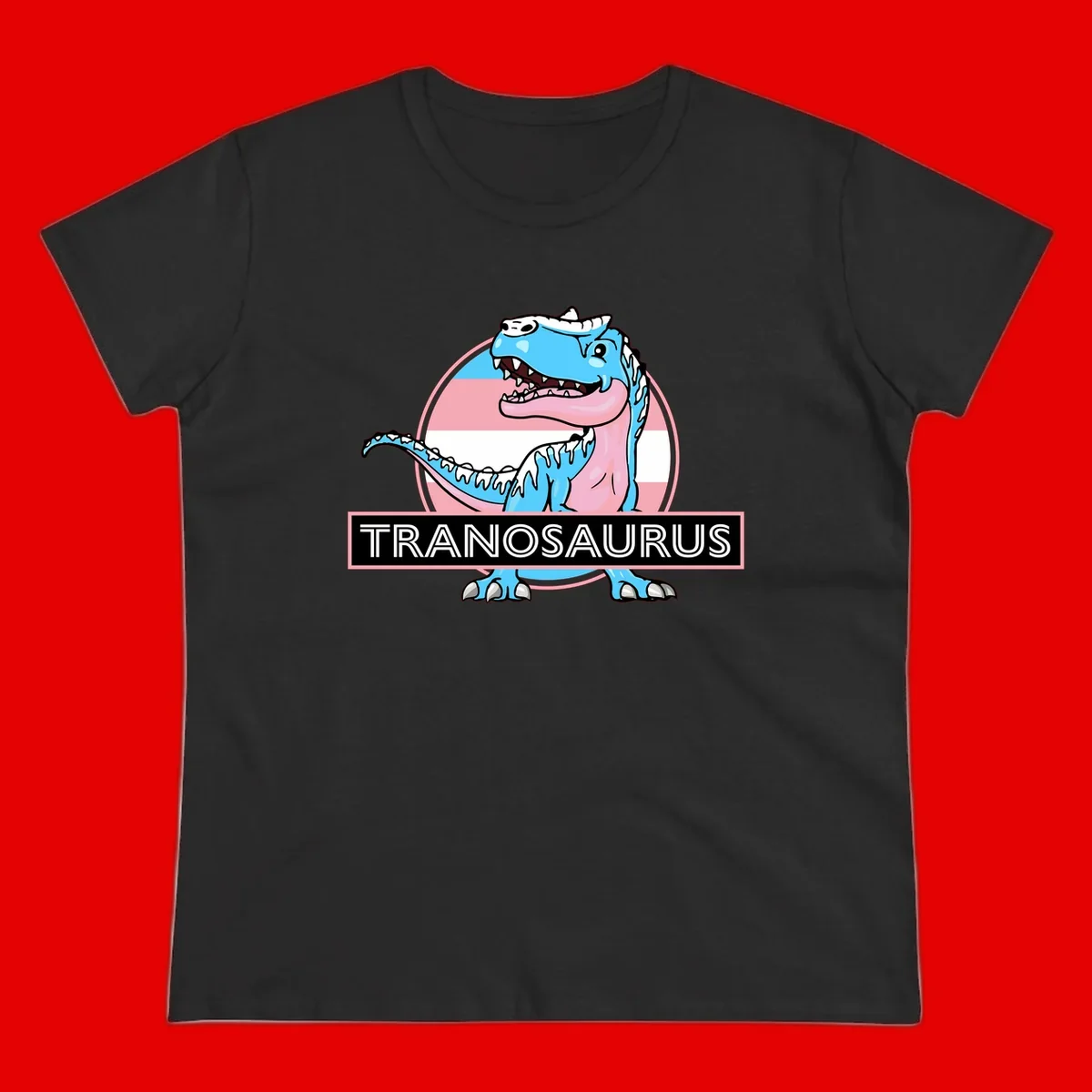 Blue cartoon T-Rex dinosaur with open mouth against pink and white pride flag circular background, labeled Tranosaurus