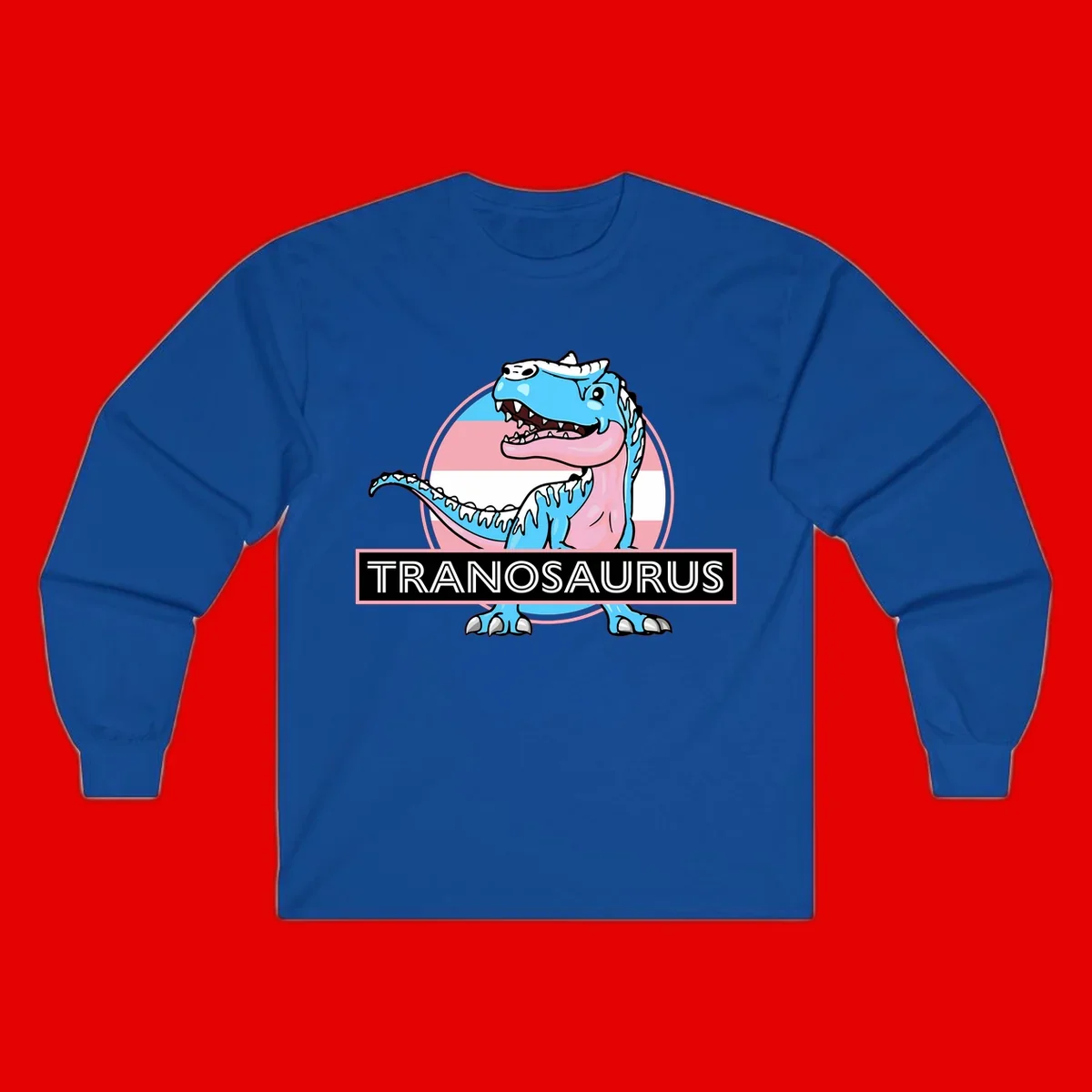 Blue cartoon T-Rex dinosaur with open mouth against pink and white pride flag circular background, labeled Tranosaurus