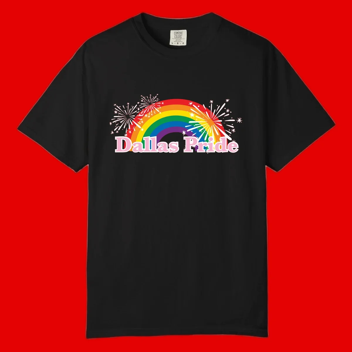 Dallas Pride design with rainbow arc, white fireworks bursts, and pink text on gray background
