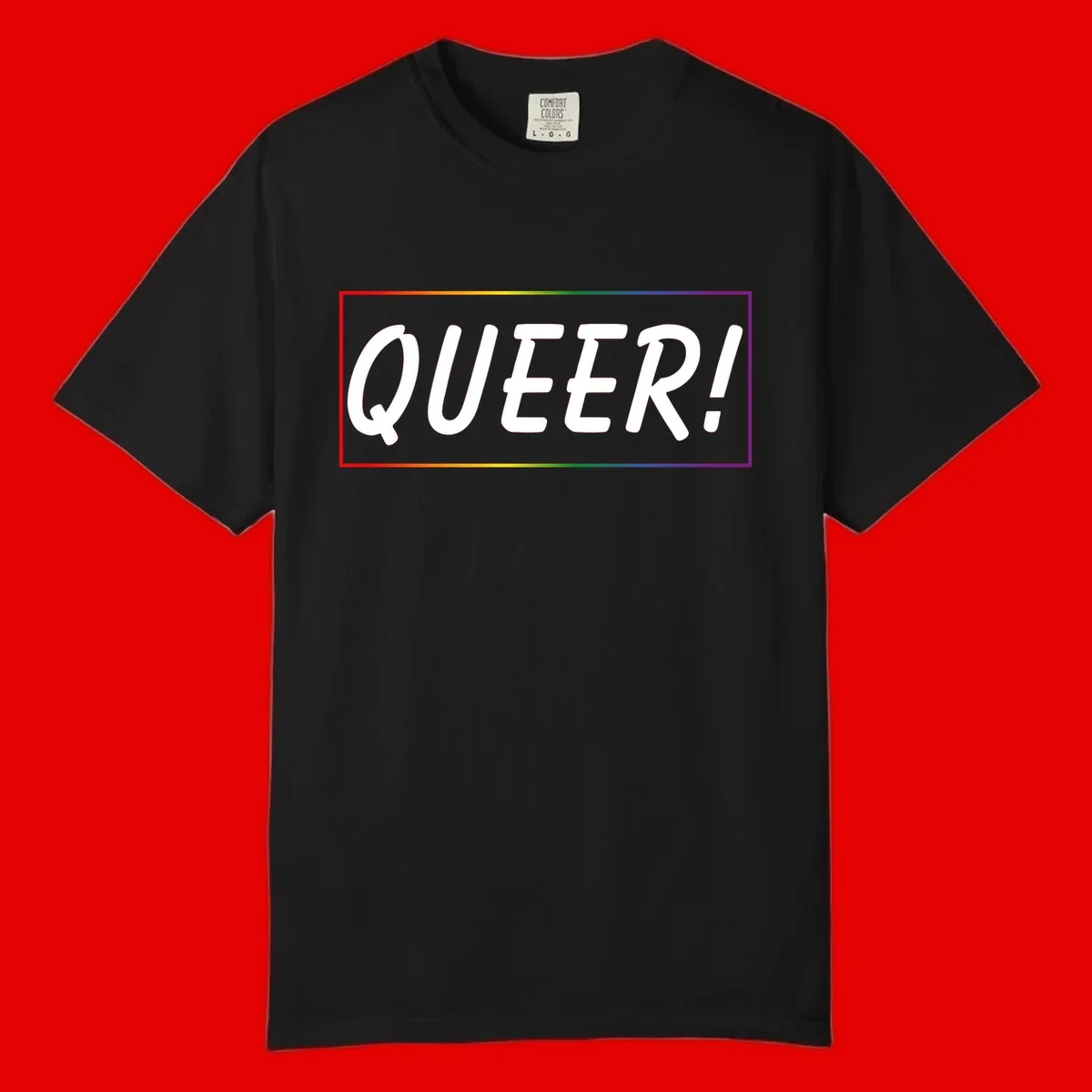 White bold text reading 'QUEER!' on gray background with rainbow gradient border representing pride colors