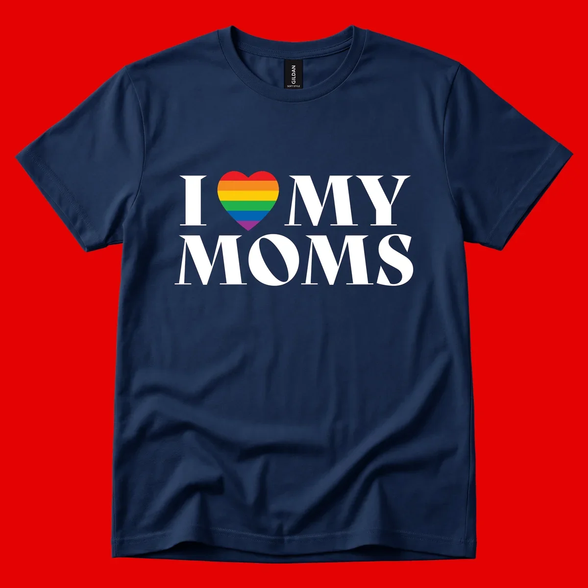 White text reading 'I love my moms' with a rainbow-striped heart symbol, celebrating LGBTQ+ family pride
