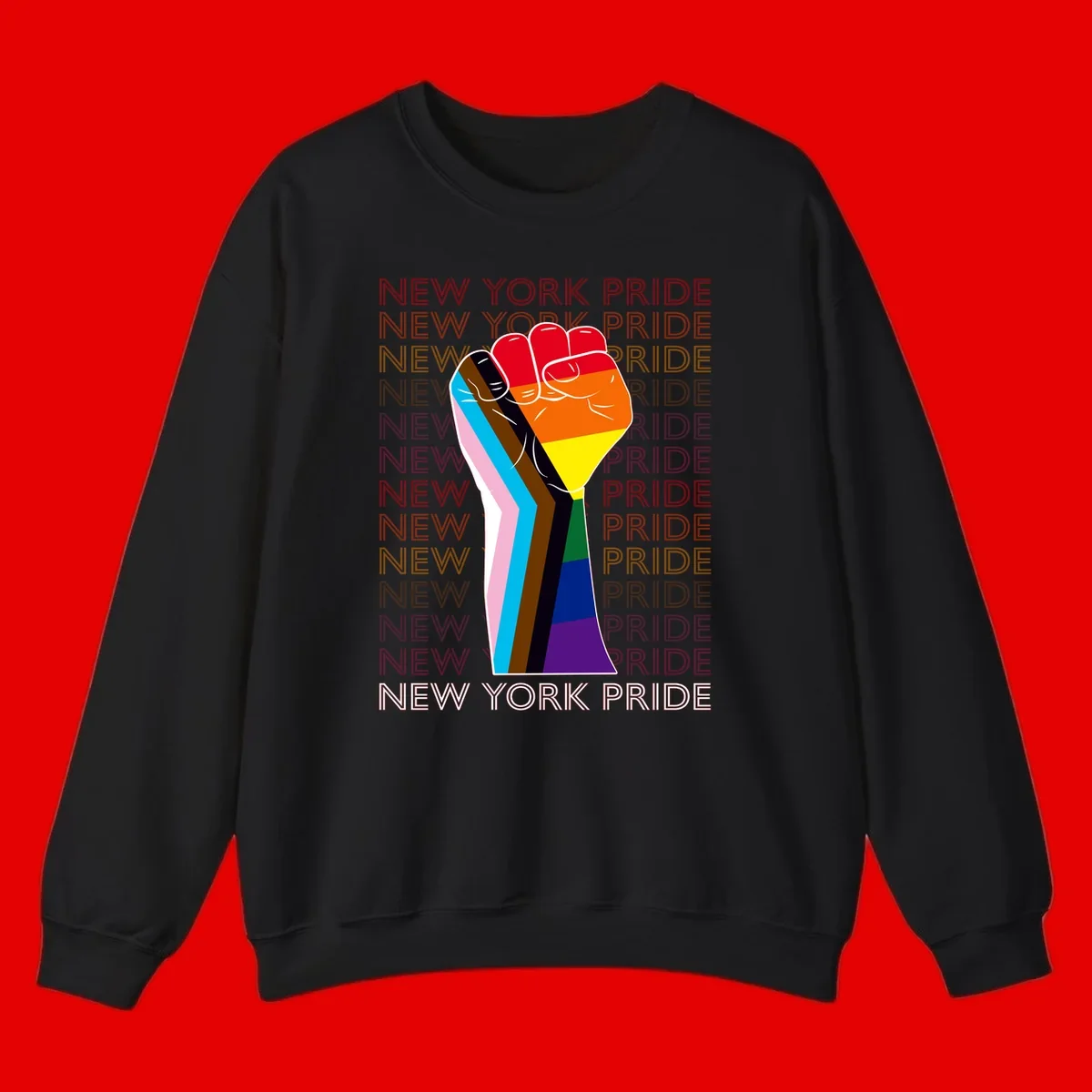 Raised fist in rainbow pride colors with pink, cyan, brown, and black diversity stripes on gray background with New York Pride text