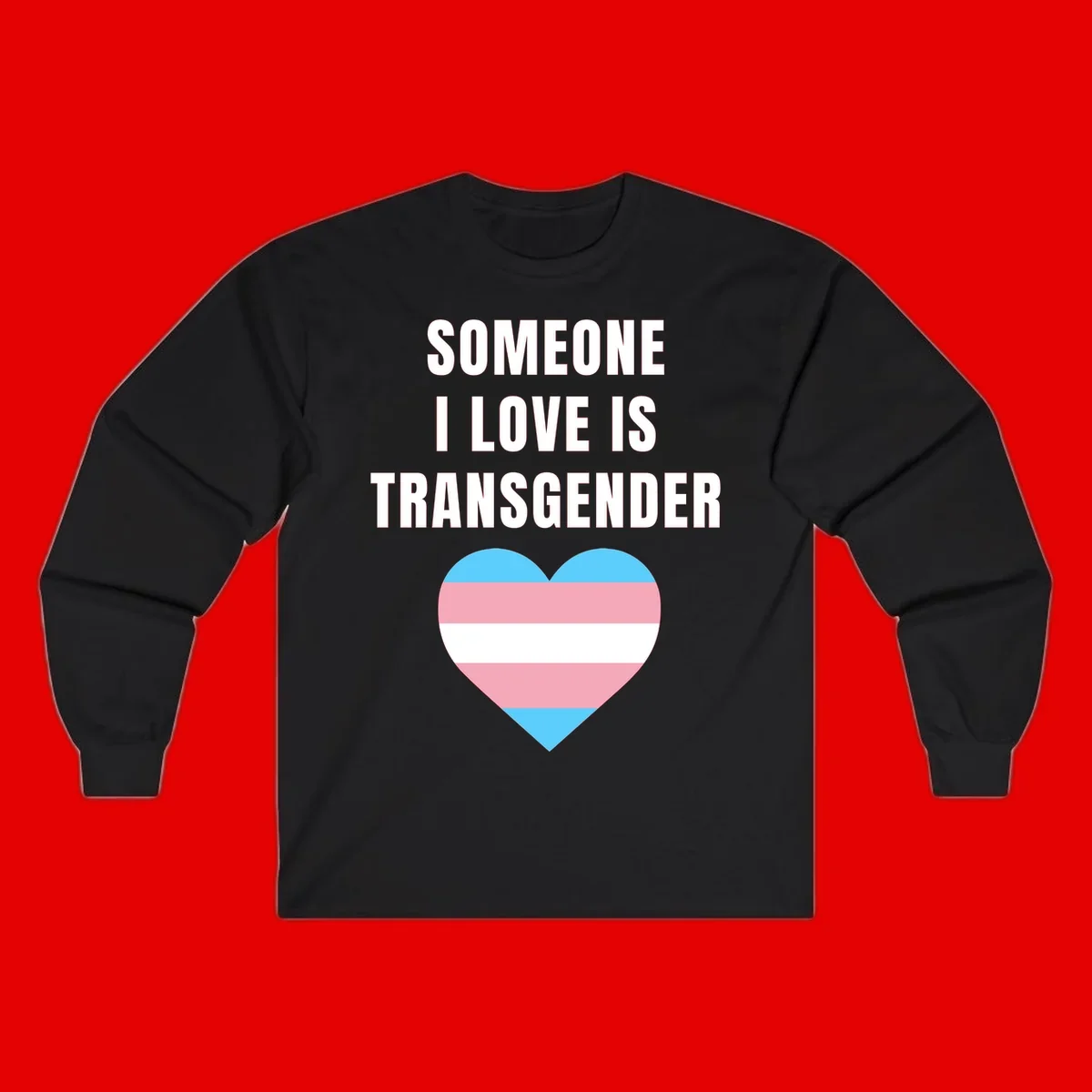 Gray background with white text reading 'Someone I Love Is Transgender' above a heart featuring blue, pink, and white transgender flag stripes