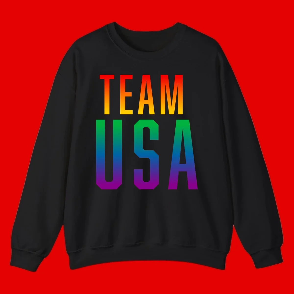 Team USA rainbow pride design with bold text gradient from red to purple representing LGBTQ+ flag colors