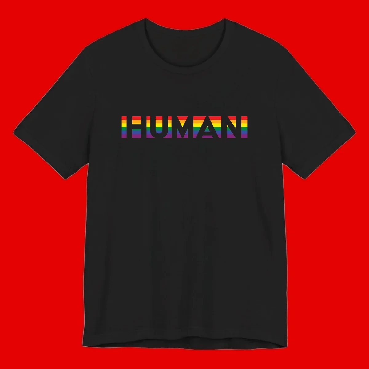 Rainbow pride letters in red, orange, yellow, green, blue, and purple stripes on gray background