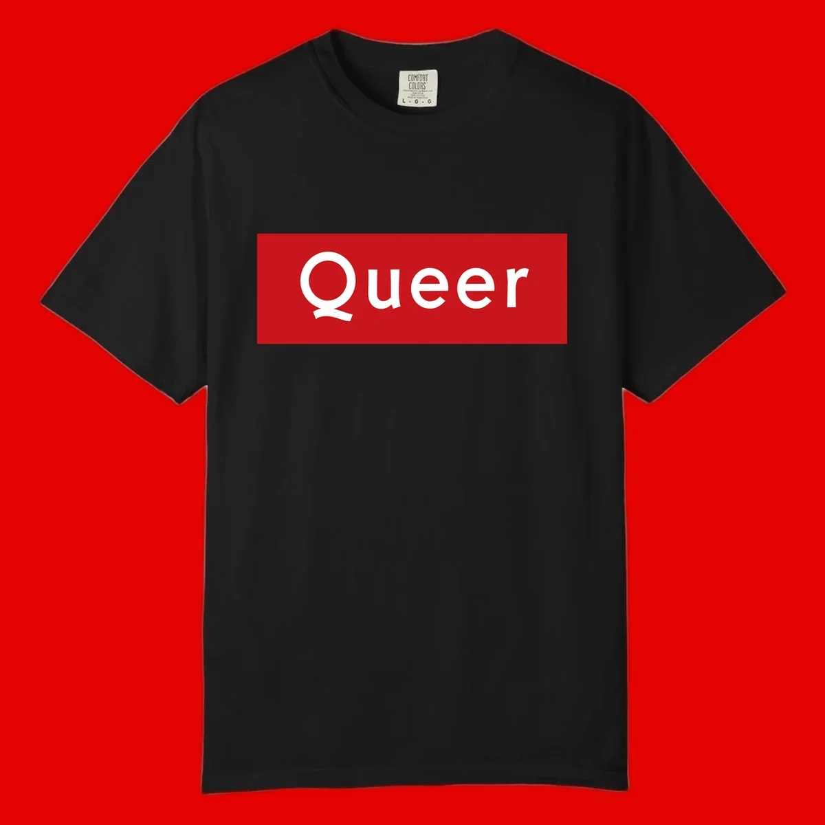 Bold white 'Queer' text on bright red background - a powerful queer pride statement design