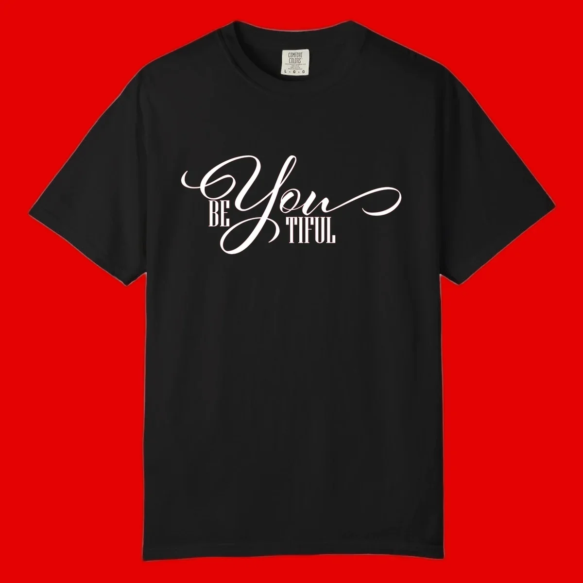 Elegant white typography reading 'BE YOU THRILL' with decorative script and serif lettering on gray background