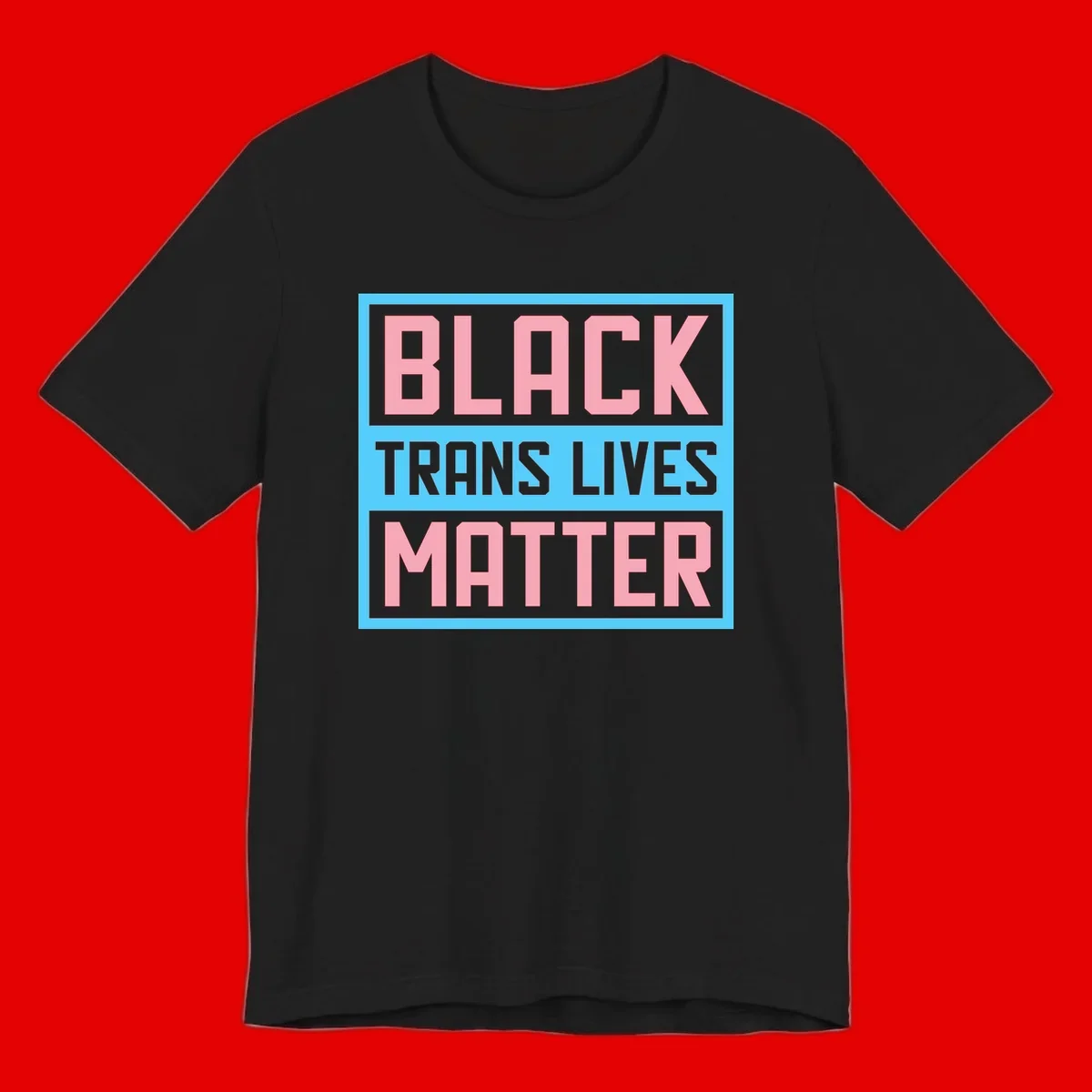 Bold pink block letters spelling 'BLACK TRANS LIVES MATTER' on light blue and gray background