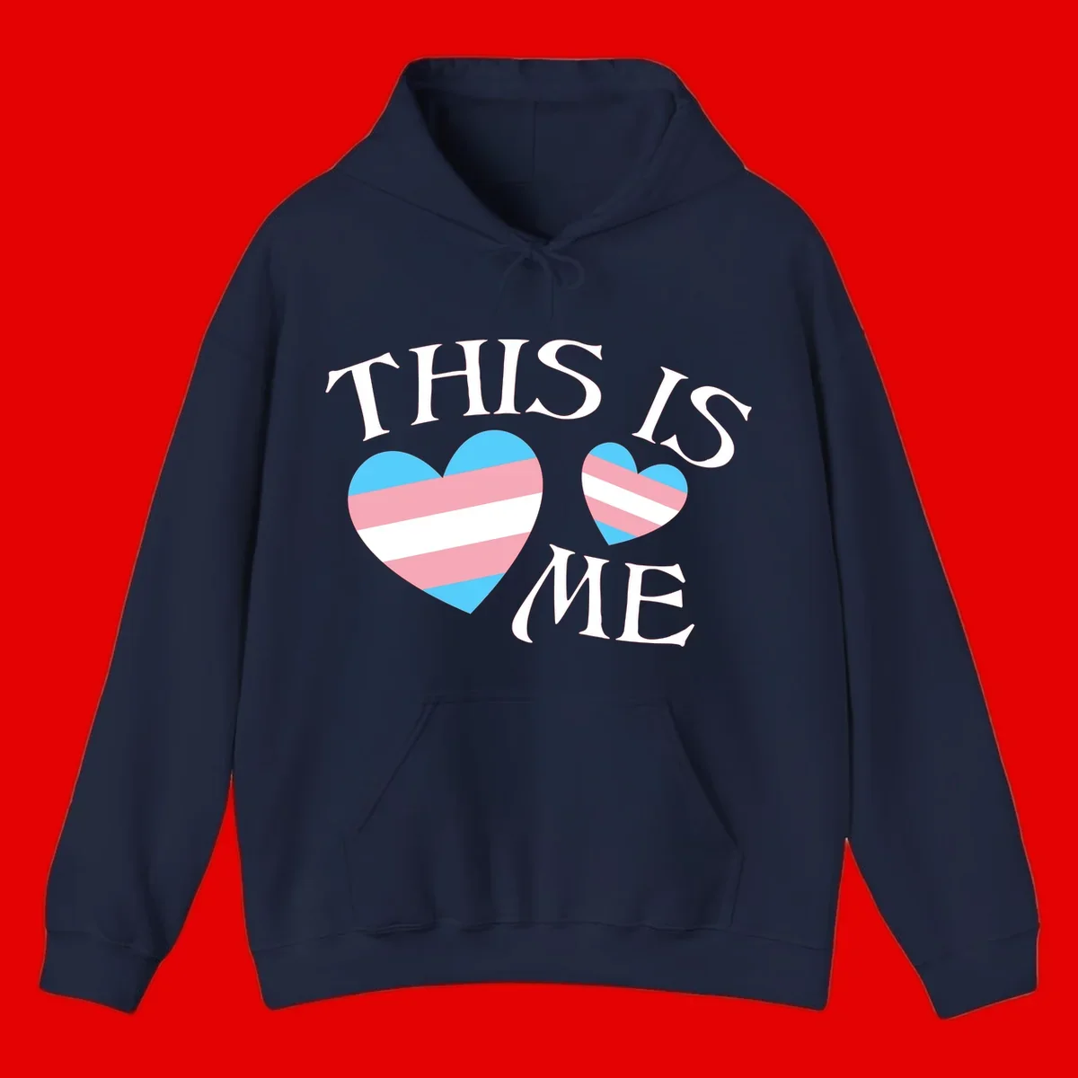 Two striped hearts in trans flag colors (blue, pink, white) with 'THIS IS ME' text celebrating trans pride and identity