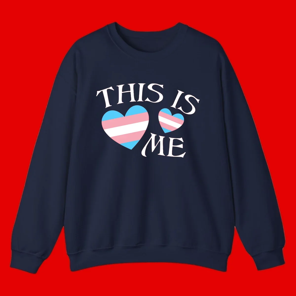 Two striped hearts in trans flag colors (blue, pink, white) with 'THIS IS ME' text celebrating trans pride and identity