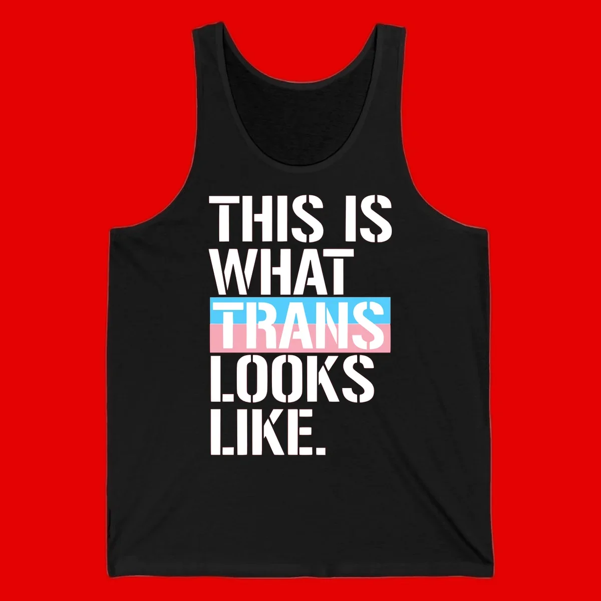Bold typography design reading 'THIS IS WHAT TRANS LOOKS LIKE' with trans pride flag colors in blue and pink stripe