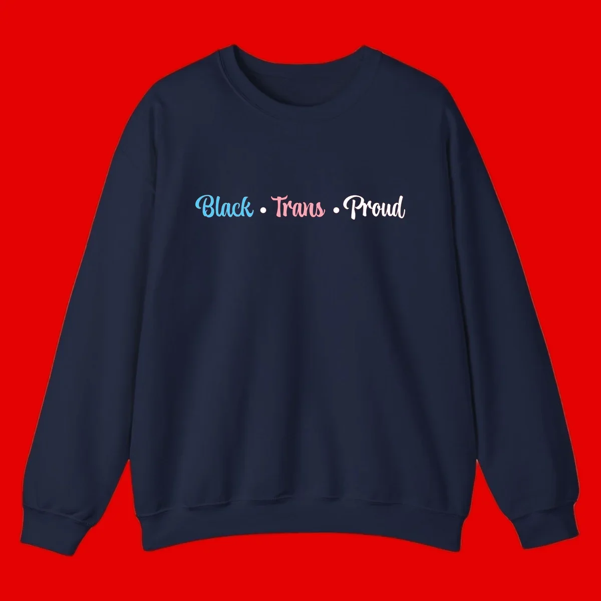 Black Trans Proud design with blue, pink, and white text on gray background, featuring decorative dots