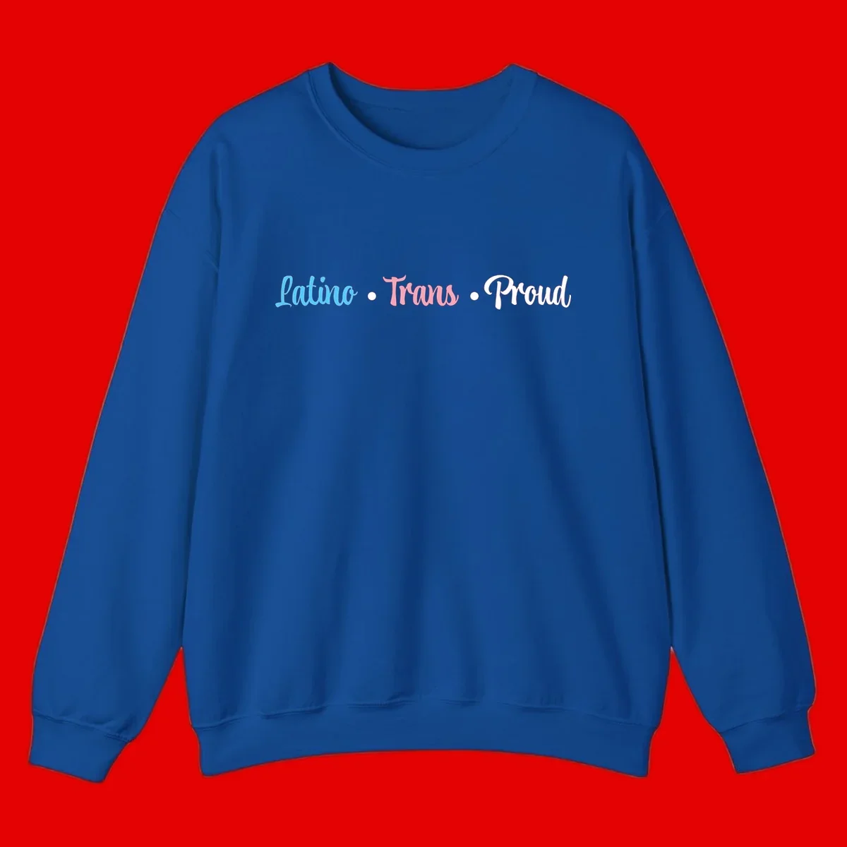 Latino Trans Proud design with blue, pink, and white script text on gray background celebrating LGBTQ identity