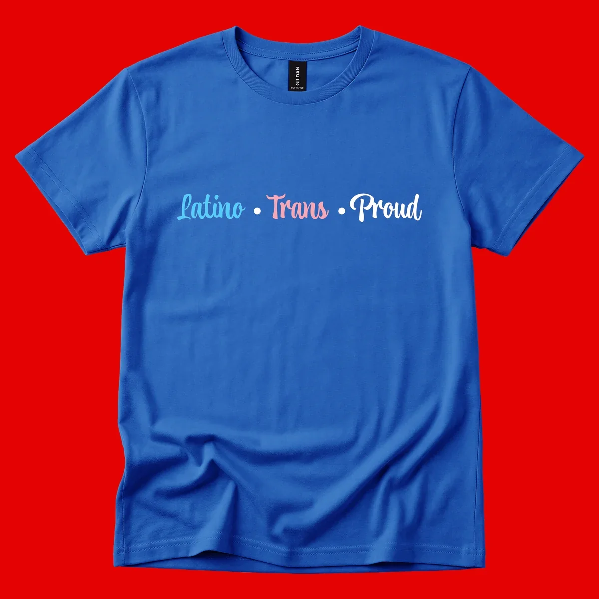 Latino Trans Proud design with blue, pink, and white script text on gray background celebrating LGBTQ identity