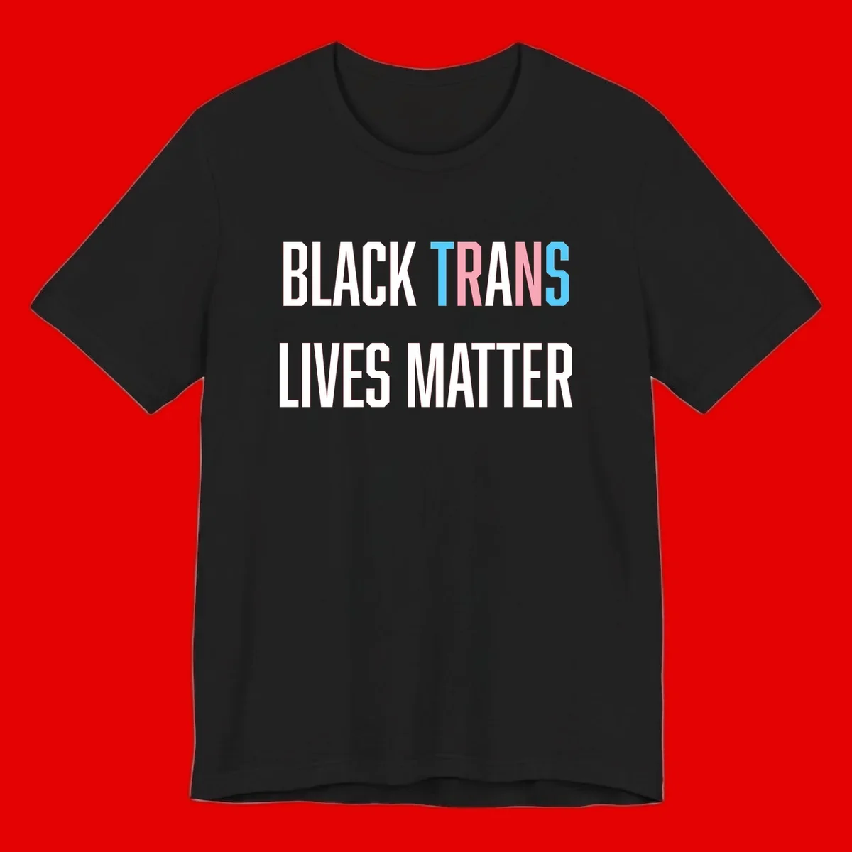 Bold typography design reading 'BLACK TRANS LIVES MATTER' with 'TRANS' in pink and cyan pride colors on gray background