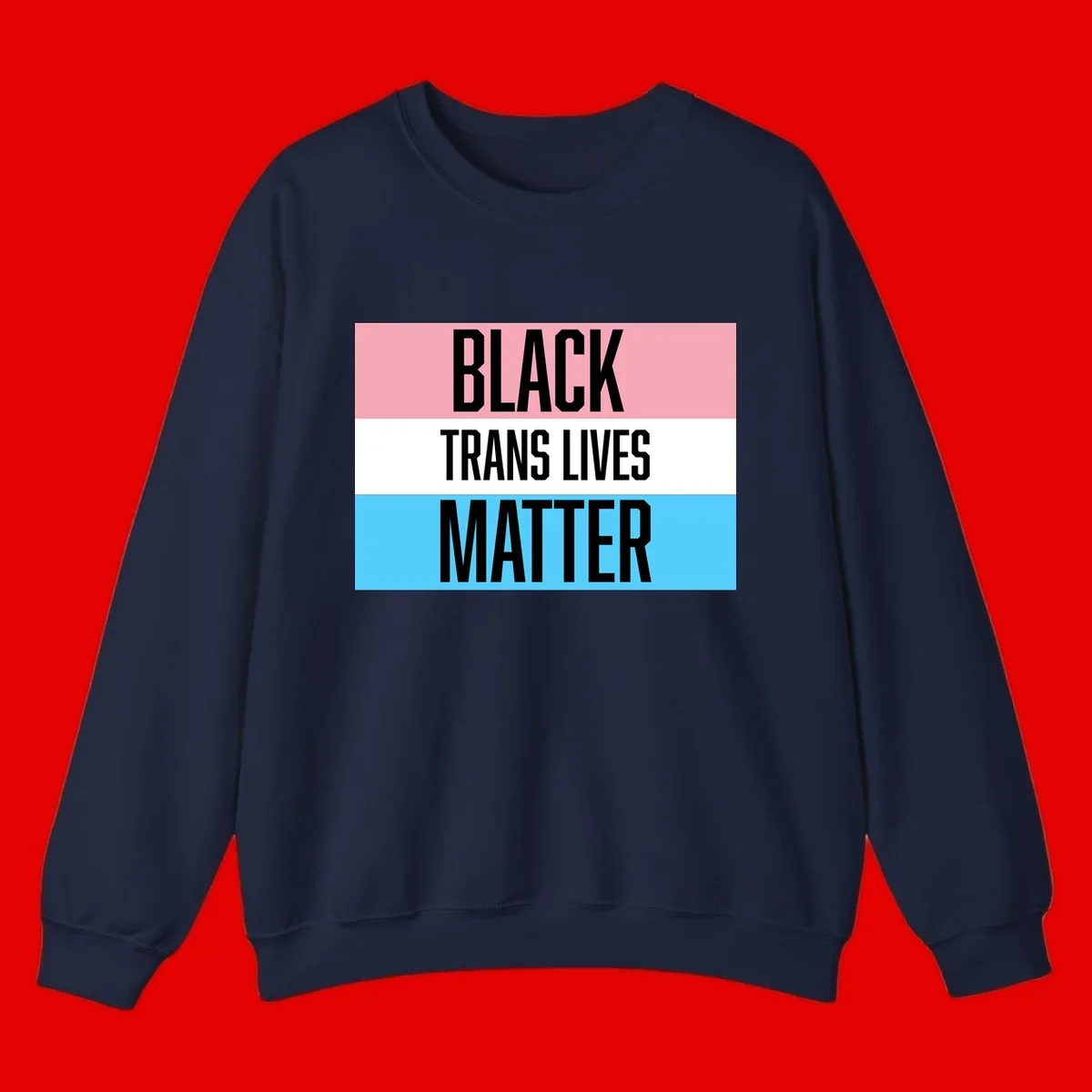 Black Trans Lives Matter design with bold text on trans pride flag colored horizontal stripes: pink, white, and blue