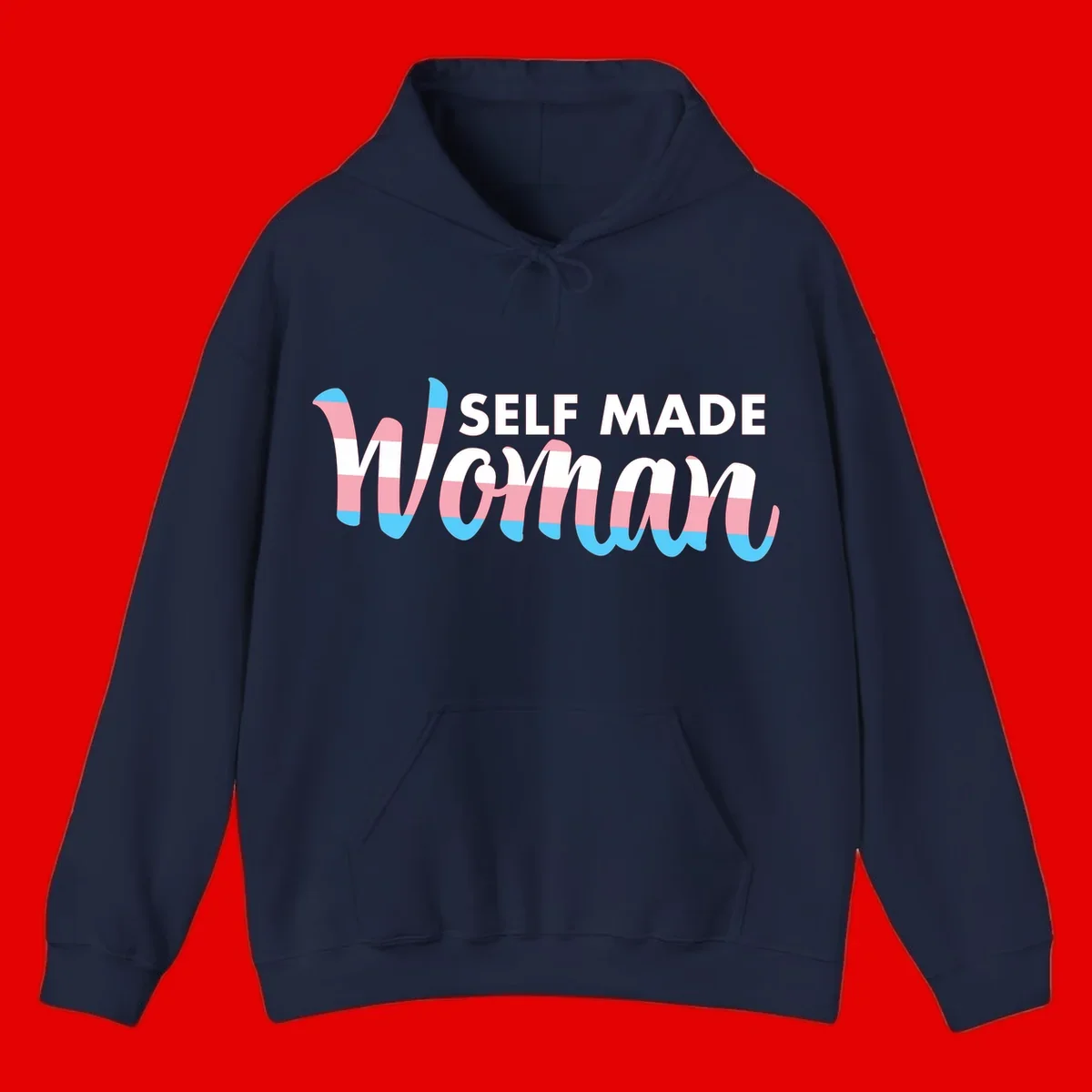 Self Made Woman design featuring bold wavy striped lettering in pink, white, and blue trans flag colors