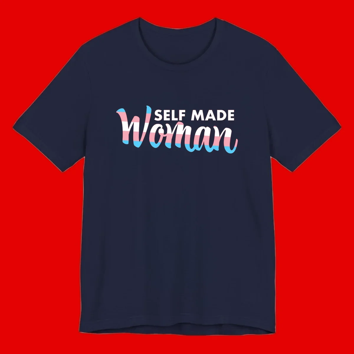 Self Made Woman design featuring bold wavy striped lettering in pink, white, and blue trans flag colors
