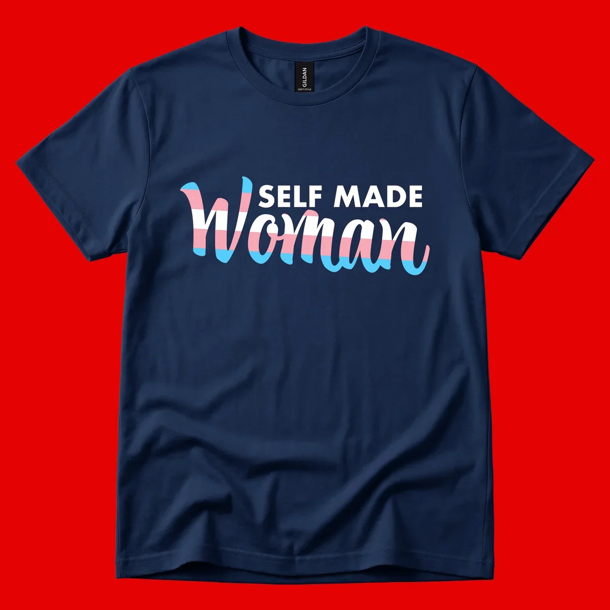 Self Made Woman design featuring bold wavy striped lettering in pink, white, and blue trans flag colors