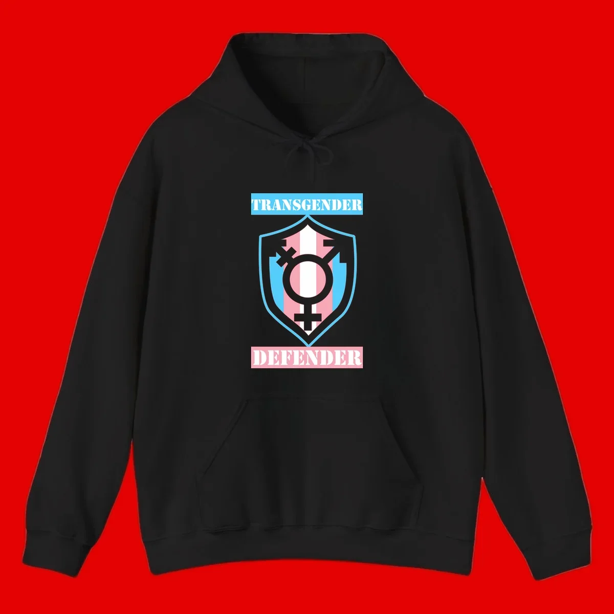 Transgender defender shield badge with centered symbol, protective arrows, and cyan-pink color scheme