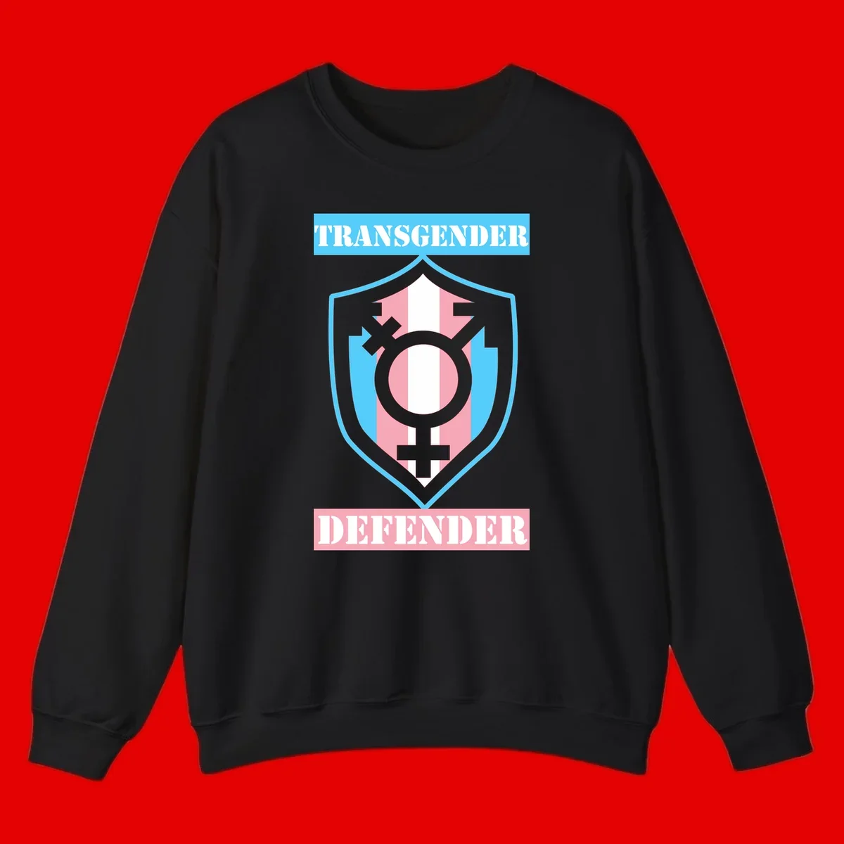 Transgender defender shield badge with centered symbol, protective arrows, and cyan-pink color scheme
